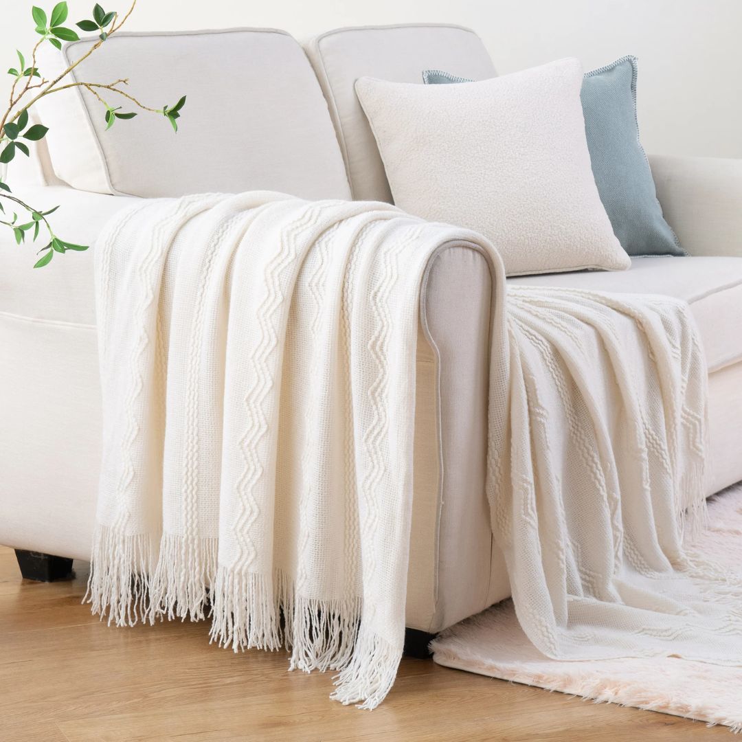 plaid-chauffant-caroussel-canape-blanc