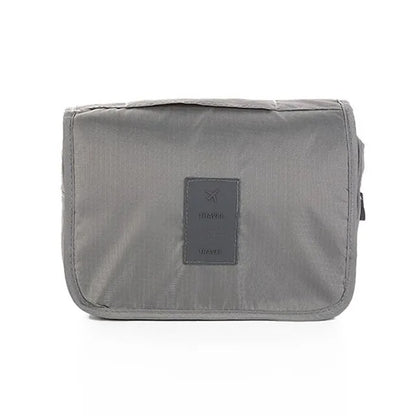 Trousse-de-toilette-gris_ffd1af90-4734-4047-9c6e-88a3d901a3f5