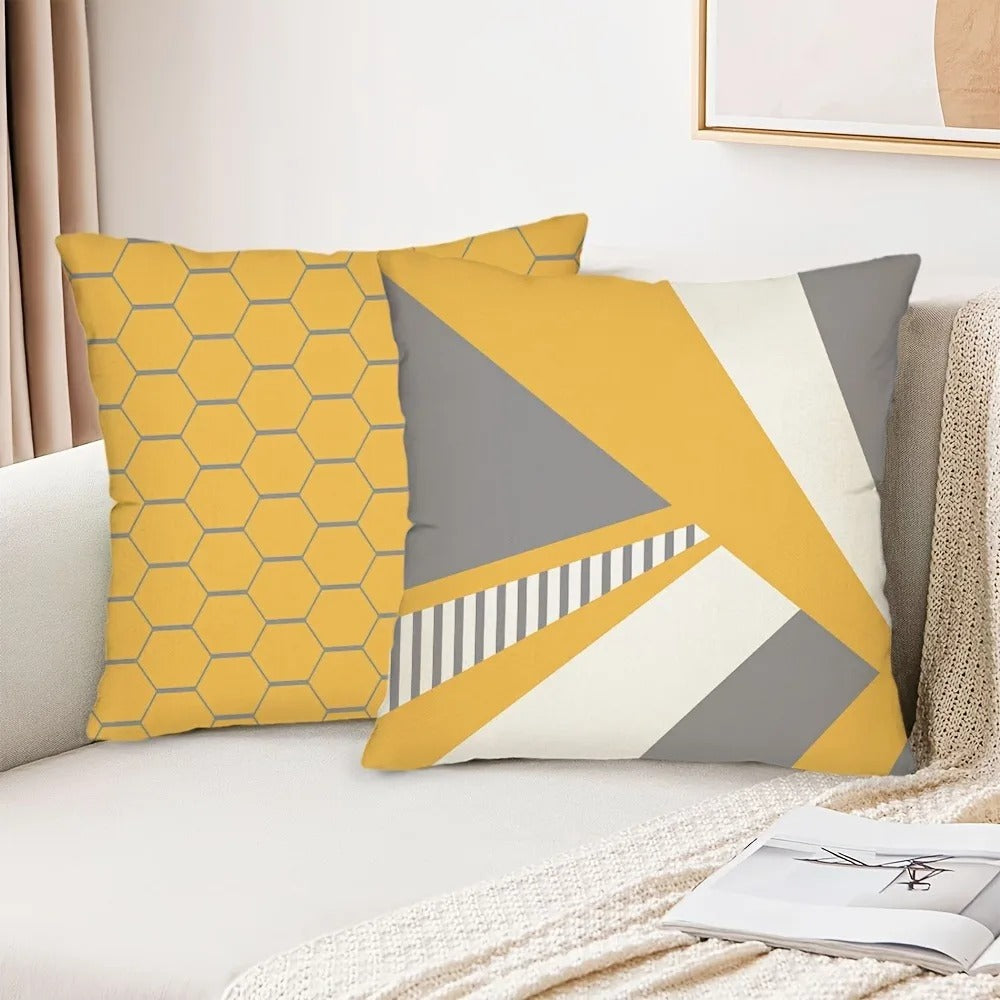 housse-de-coussin-canape-springcover-deux-caroussel-losanges-geometriques