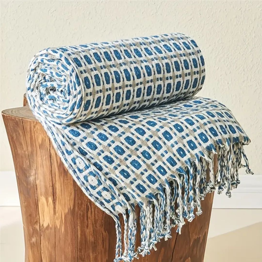 plaid-chaud-horizons-bleu-roulé
