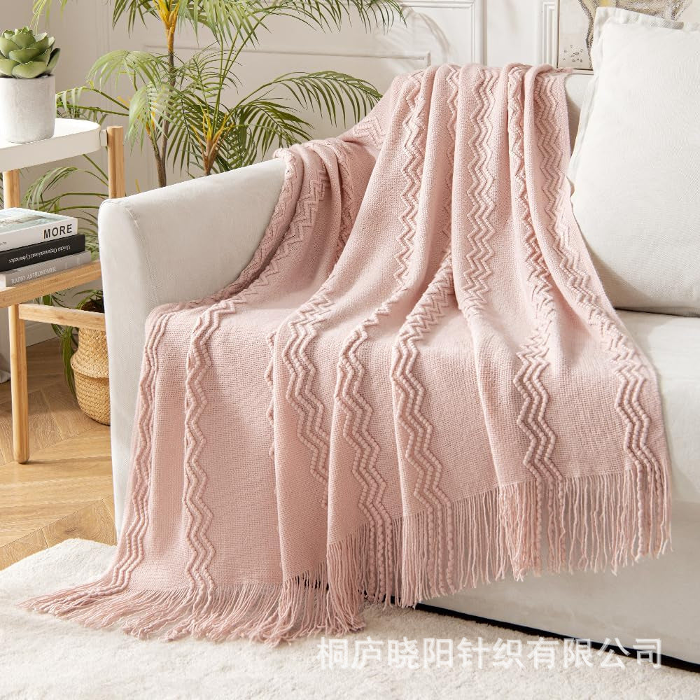 plaid-chauffant-aurore-rose-canapé