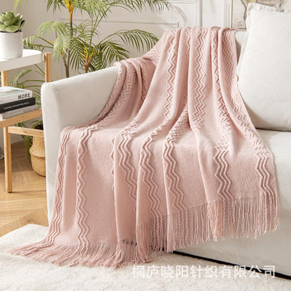 plaid-chauffant-aurore-rose-canapé