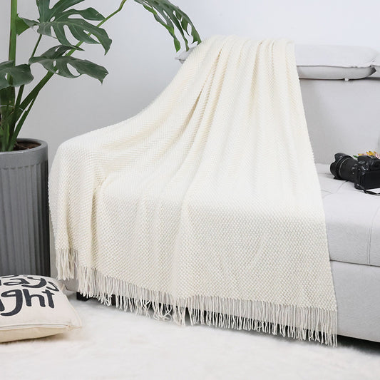 plaid-chauffant-azur-blanc-canapé