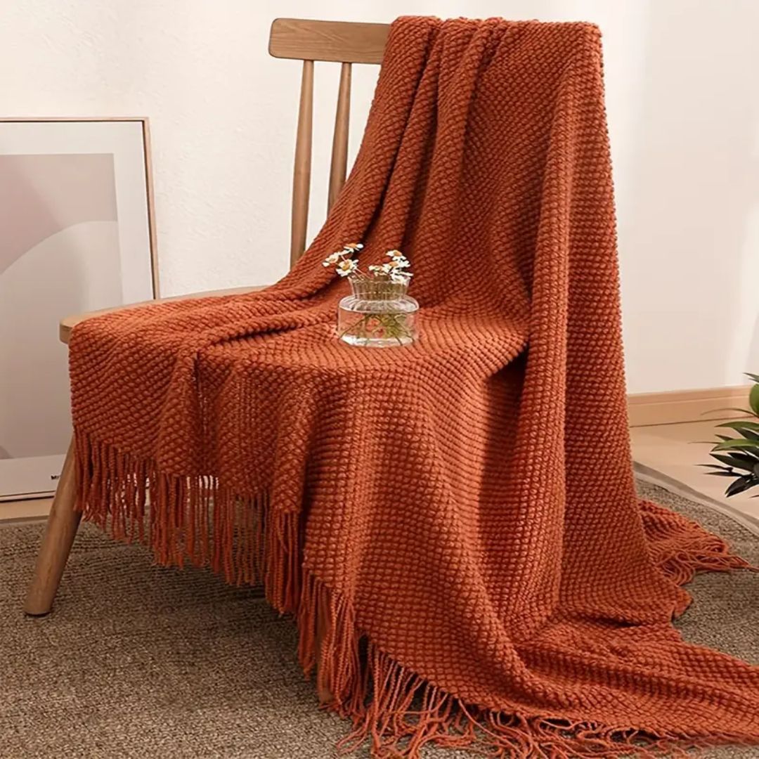 plaid-chauffant-azur-saumon-chaise