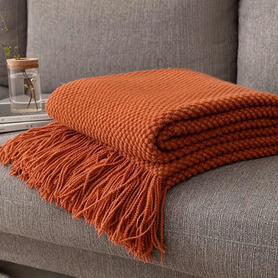plaid-chauffant-azur-saumon-fauteuil
