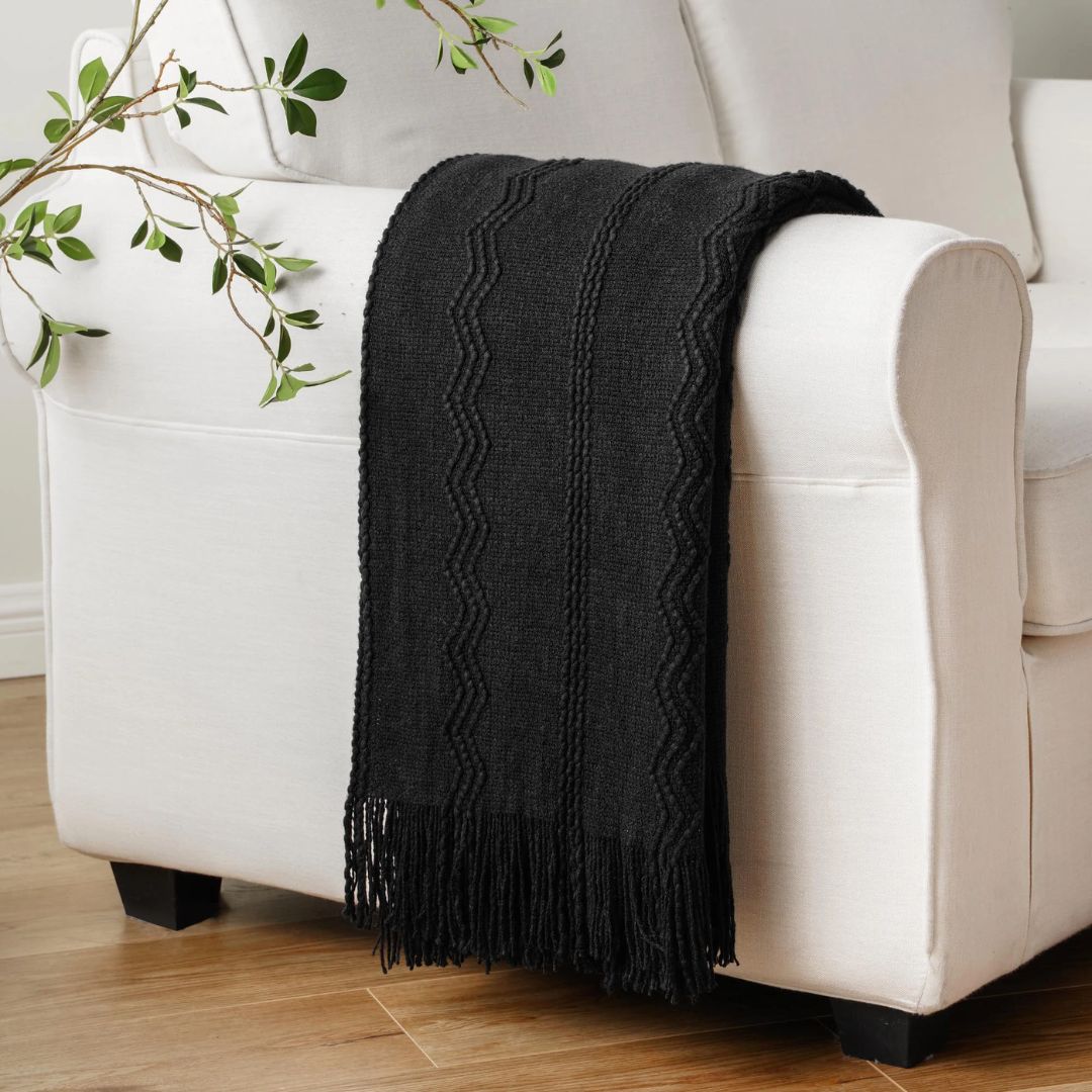 plaid-chauffant-caroussel-canape-motifs-noir