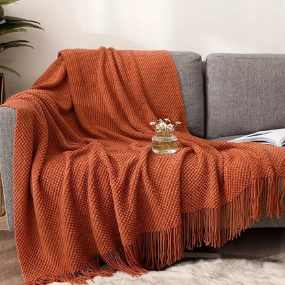 plaid-chauffant-caroussel-canape-rouge-brique