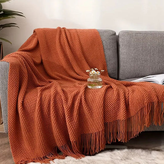 plaid-chauffant-caroussel-canape-rouge-brique