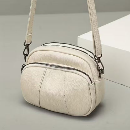 sac-a-bandouliere-femme-blanc-ville