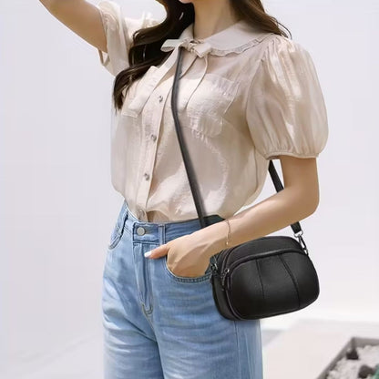 sac-a-bandouliere-noir-femme-decontractee